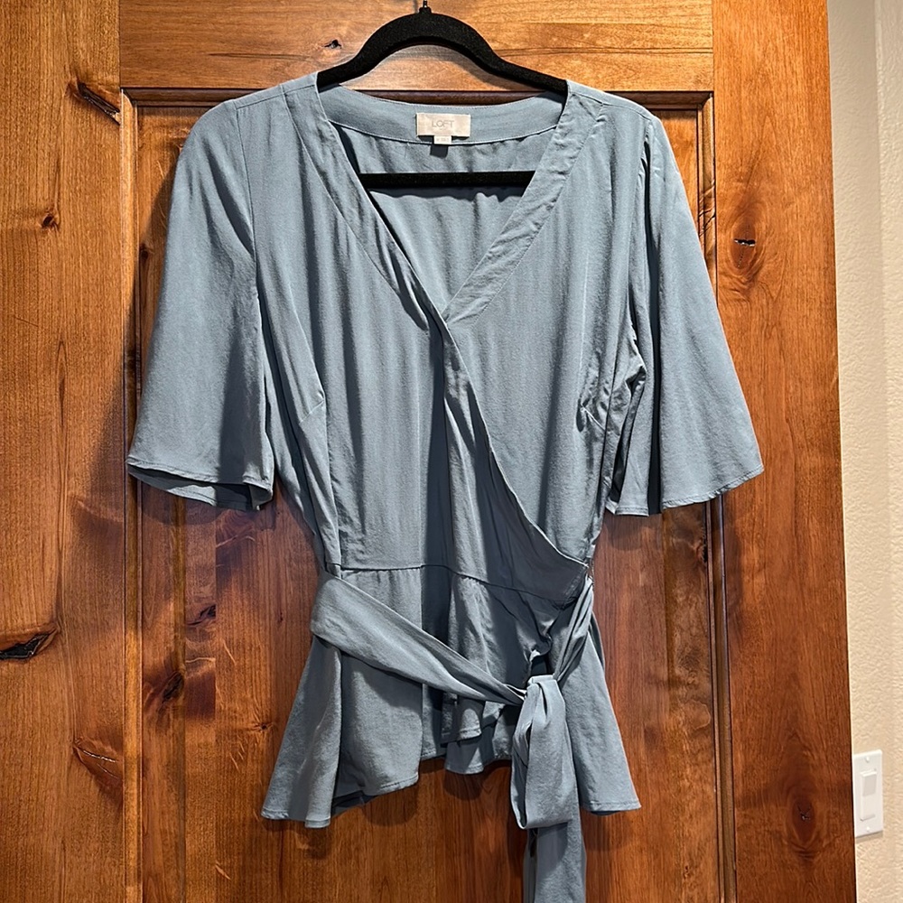 Beautiful blue Loft wrap front and flowy sleeve top!